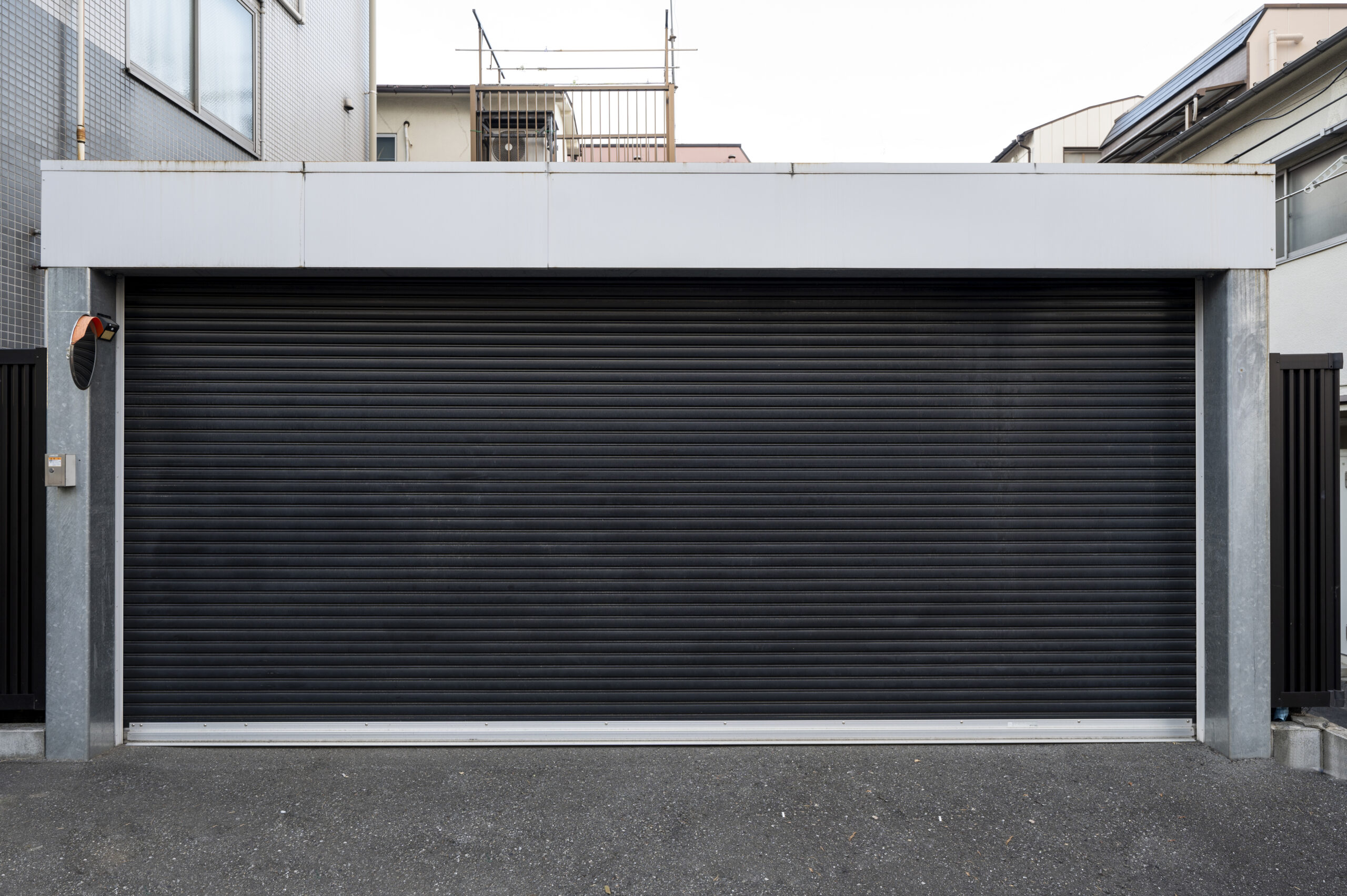 Sectional Doors 1 Residential garage door installation with modern rolling shutter design